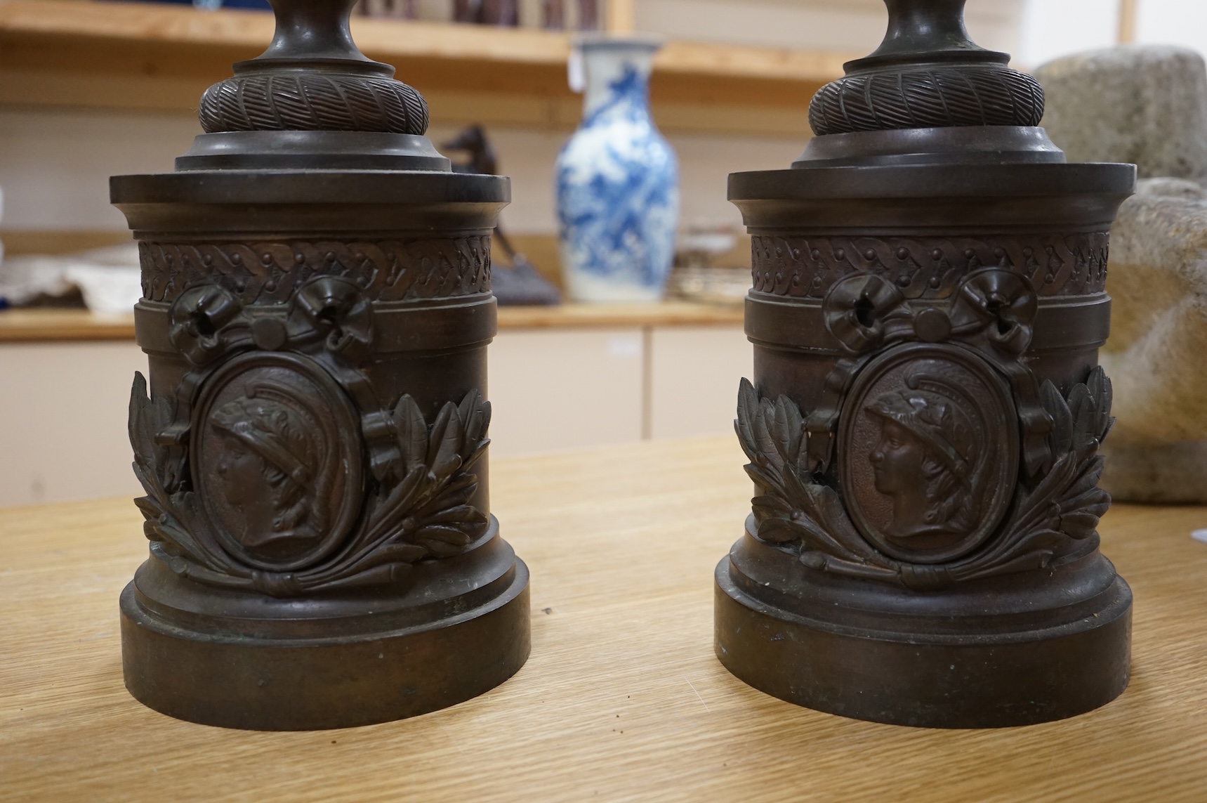 A pair of Grand Tour style bronze rams' head vases, H 55cm W 18cm